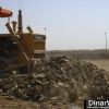 bulldozer pushes mines.JPG