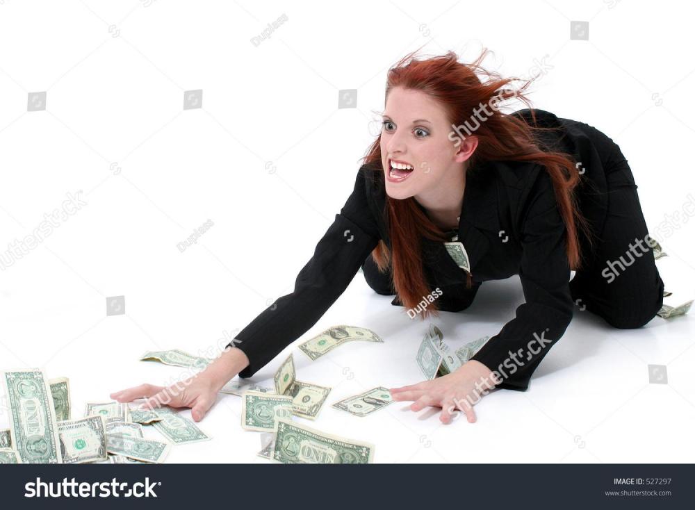 stock-photo-crazed-business-woman-grabbing-money-from-floor-very-funny-expression-on-model-s-face-shot-in-527297.jpg